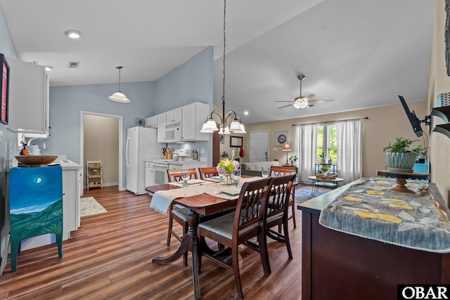 116 First Colony Ct Lot 4, Manteo, NC 27954 - dining room featuring vaulted ceiling, a ceiling fan, wood finished floors, and a chandelier