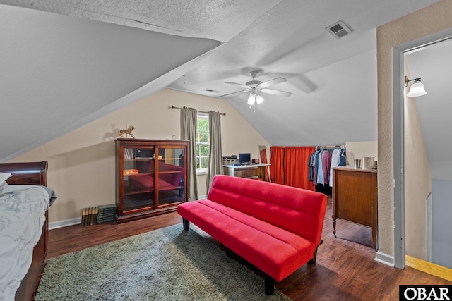 116 First Colony Ct Lot 4, Manteo, NC 27954 - bedroom featuring wood finished floors, vaulted ceiling, a ceiling fan, and a textured ceiling