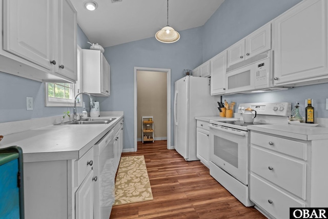 116 First Colony Ct Lot 4, Manteo, NC 27954 - kitchen featuring white appliances, white cabinetry, light countertops, wood finished floors, and lofted ceiling