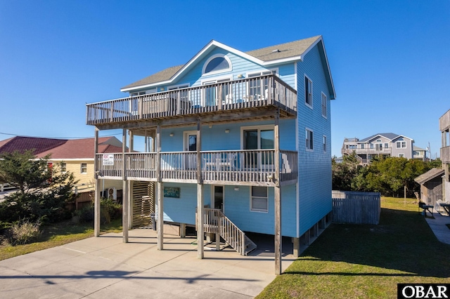 25270 Sea Isle Hills Dr Lot 5-18, Waves, NC 27982 - back of house featuring a wooden deck and stairway
