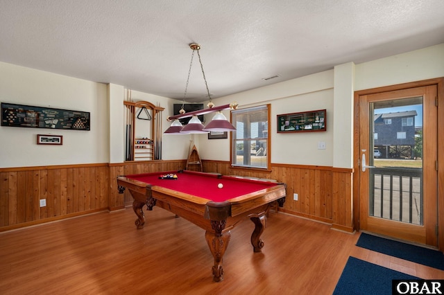 25270 Sea Isle Hills Dr Lot 5-18, Waves, NC 27982 - recreation room with wood finished floors, wooden walls, a textured ceiling, pool table, and a wainscoted wall