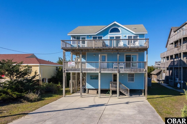 25270 Sea Isle Hills Dr Lot 5-18, Waves, NC 27982 - coastal home featuring driveway