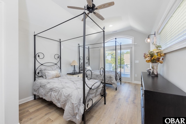 bedroom with vaulted ceiling, access to outside, baseboards, and light wood-style floors