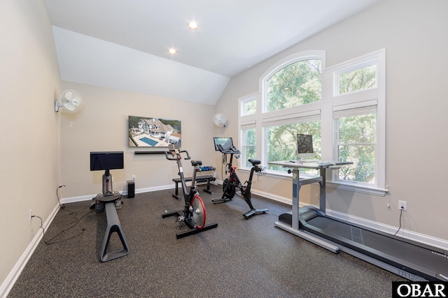 exercise area with lofted ceiling, baseboards, and recessed lighting