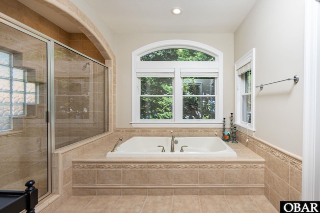 full bath with recessed lighting, tile patterned flooring, a garden tub, and a shower stall