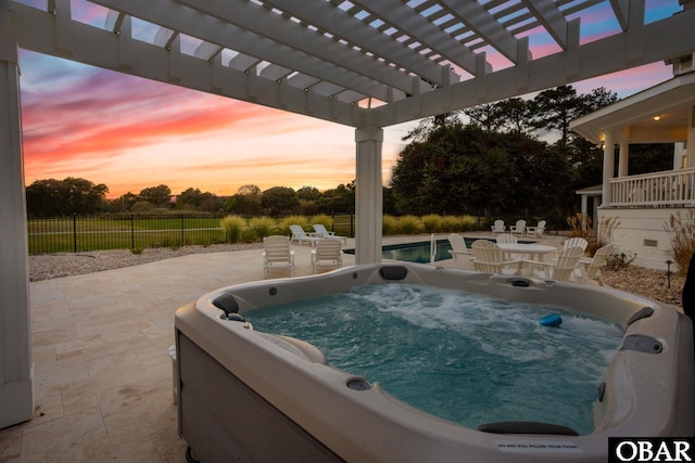 view of pool featuring a patio area, a hot tub, fence, and a pergola