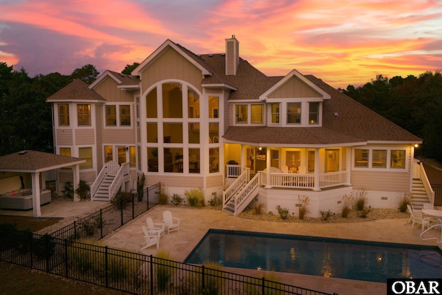 back of property featuring stairs, a patio, crawl space, and fence