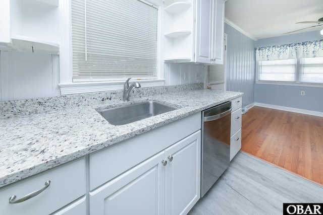 202 Winfall Blvd, Hertford, NC 27944 - kitchen featuring stainless steel dishwasher, light wood-style floors, a ceiling fan, white cabinetry, and open shelves