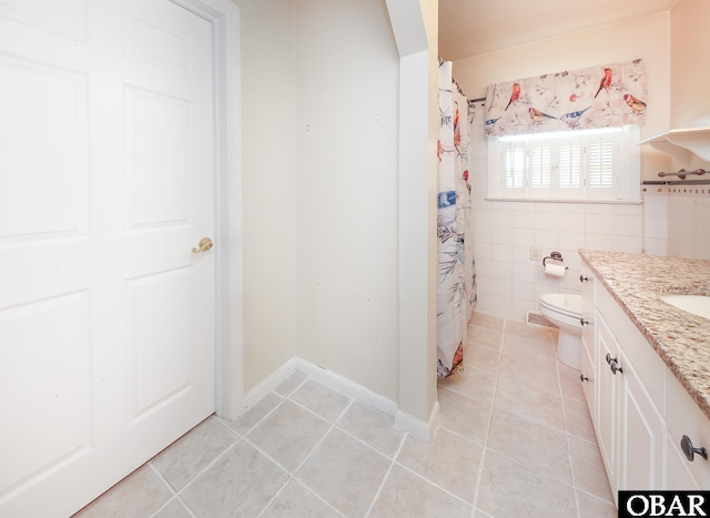 202 Winfall Blvd, Hertford, NC 27944 - full bathroom with tile patterned flooring, vanity, tile walls, and curtained shower