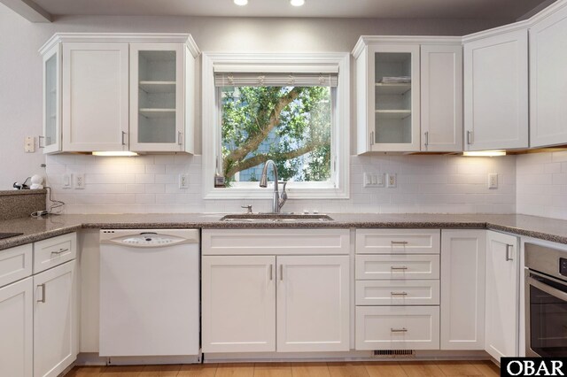 103 King Edward Ct Lot 13, Kill Devil Hills, NC 27948 - kitchen featuring white dishwasher, a sink, white cabinetry, stainless steel oven, and recessed lighting