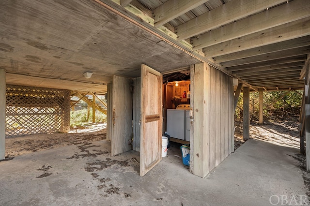 view of patio with washing machine and dryer