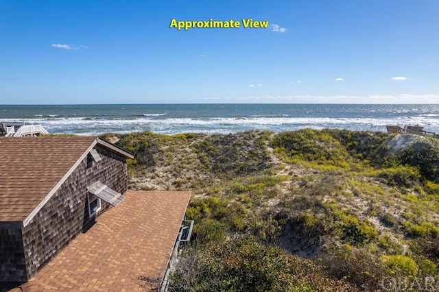 property view of water featuring a beach view