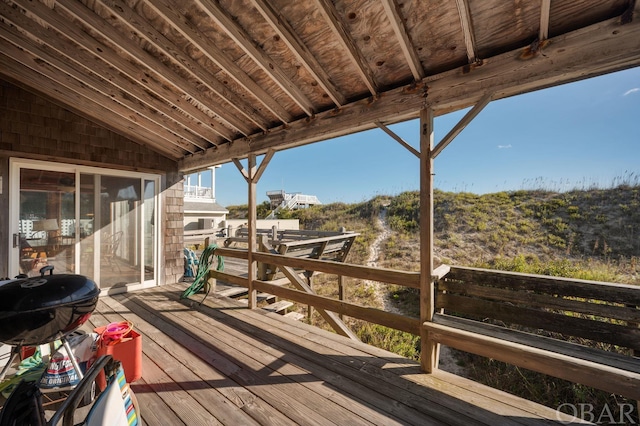 wooden deck with area for grilling