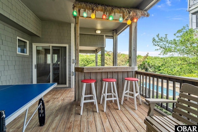 deck with outdoor dry bar