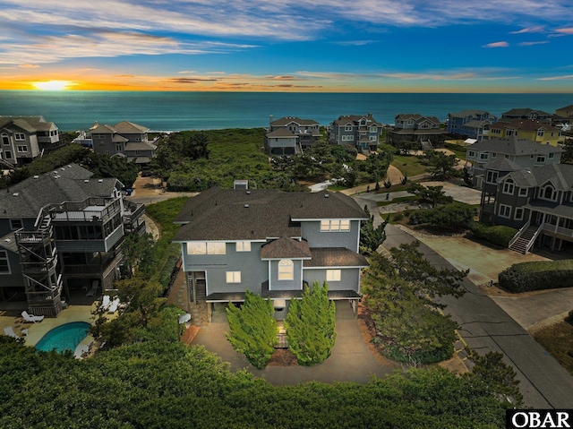 aerial view featuring a residential view and a water view