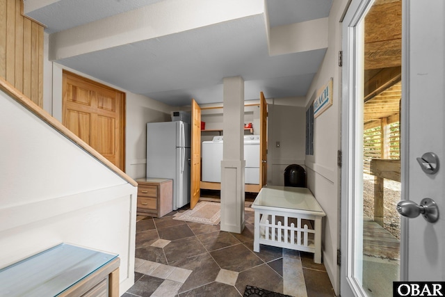 entryway featuring washer / dryer