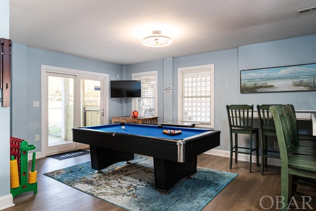 game room featuring dark wood-style flooring, visible vents, billiards, and a textured ceiling