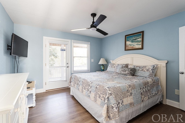 bedroom with dark wood-style floors, access to exterior, baseboards, and a ceiling fan