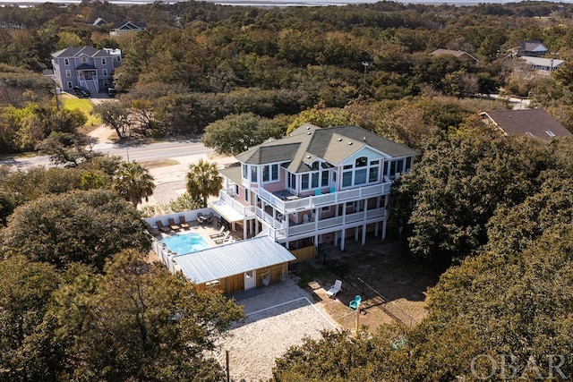 aerial view with a wooded view