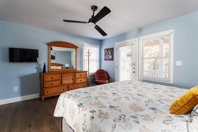 bedroom with dark wood-style floors, access to outside, baseboards, and a ceiling fan