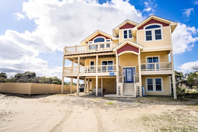 view of front of house featuring fence