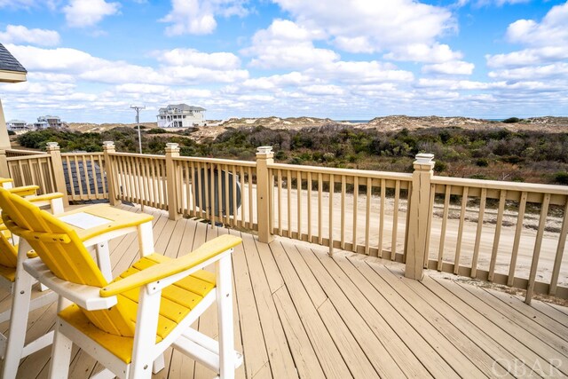 wooden terrace with a mountain view