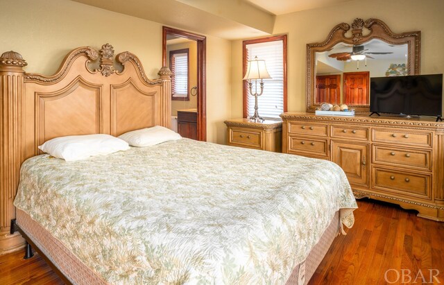 bedroom featuring dark wood-type flooring