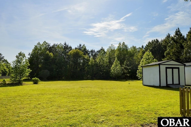 524 Aydlett Rd, Aydlett, NC 27916 - view of grassy yard featuring a storage unit