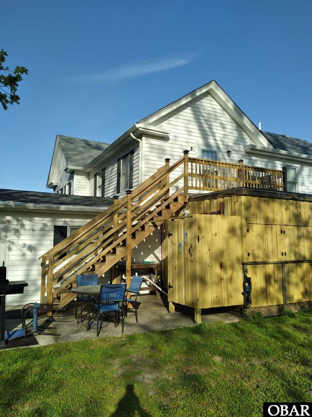 524 Aydlett Rd, Aydlett, NC 27916 - rear view of property featuring a patio, a deck, stairs, and a lawn