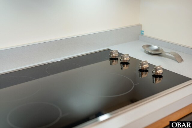 room details featuring black electric cooktop