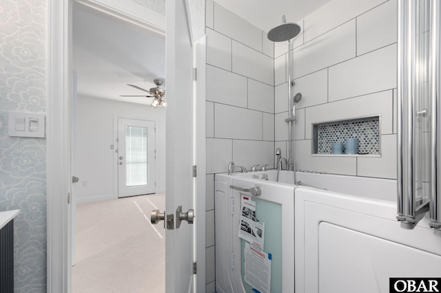 laundry room featuring ceiling fan, laundry area, washer / clothes dryer, and light colored carpet