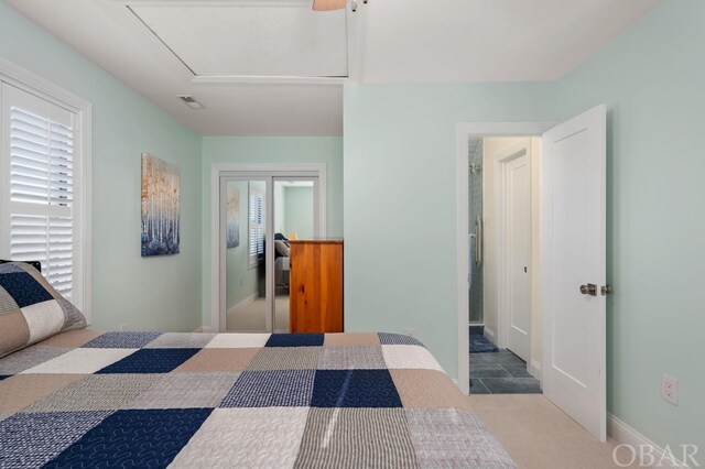 bedroom featuring a closet and visible vents