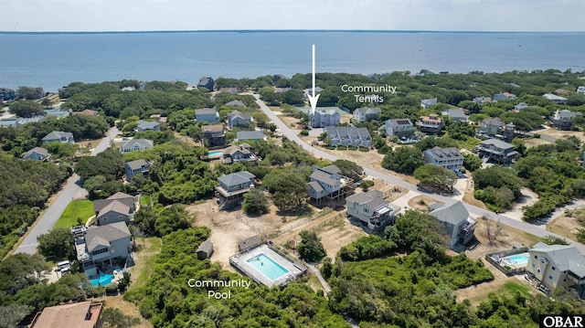 aerial view featuring a residential view and a water view