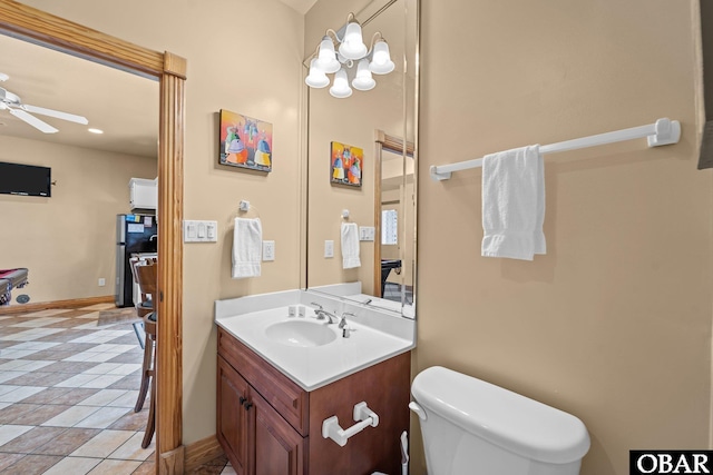 109 Duck Ridge Village Ct Lot 14, Duck, NC 27949 - bathroom with a ceiling fan, toilet, vanity, and baseboards