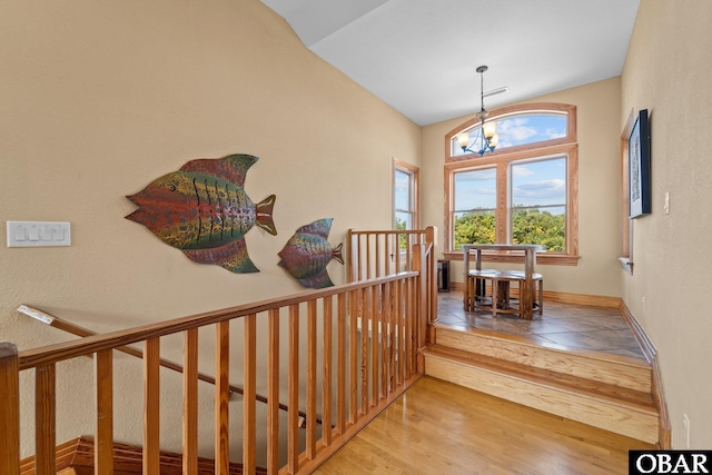 109 Duck Ridge Village Ct Lot 14, Duck, NC 27949 - staircase with wood finished floors, lofted ceiling, and baseboards