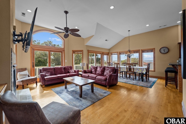 109 Duck Ridge Village Ct Lot 14, Duck, NC 27949 - living area with light wood-type flooring, recessed lighting, a chandelier, high vaulted ceiling, and a ceiling fan