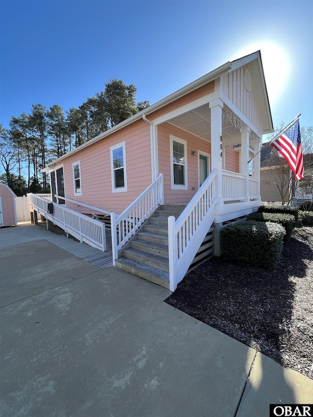 view of front of property with a porch and board and batten siding