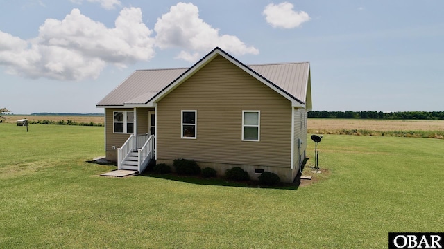 269 Lakeview Ct Lot 12, Engelhard, NC 27824 - rear view of property featuring a lawn and a metal roof