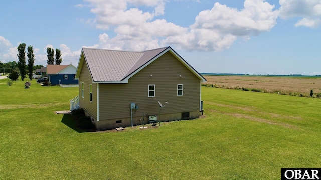 269 Lakeview Ct Lot 12, Engelhard, NC 27824 - view of side of property with a lawn and a metal roof