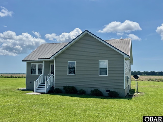 269 Lakeview Ct Lot 12, Engelhard, NC 27824 - view of front of home featuring a front yard and a metal roof