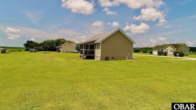 269 Lakeview Ct Lot 12, Engelhard, NC 27824 - view of property exterior featuring crawl space, a sunroom, and a lawn
