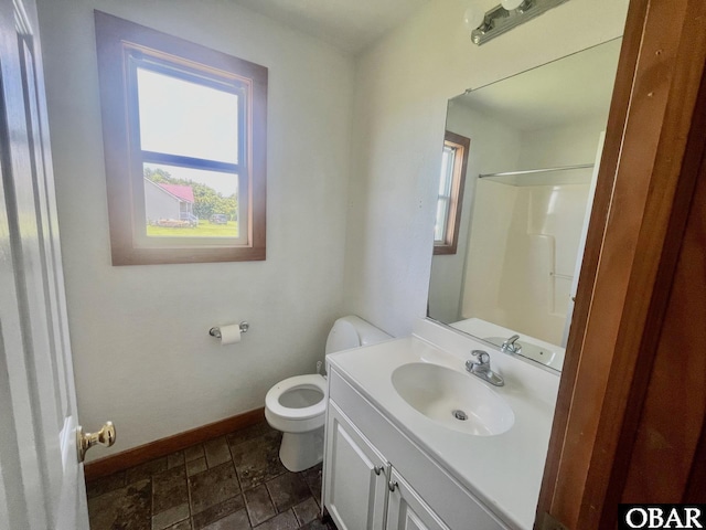 269 Lakeview Ct Lot 12, Engelhard, NC 27824 - full bath with stone tile floors, vanity, and a shower