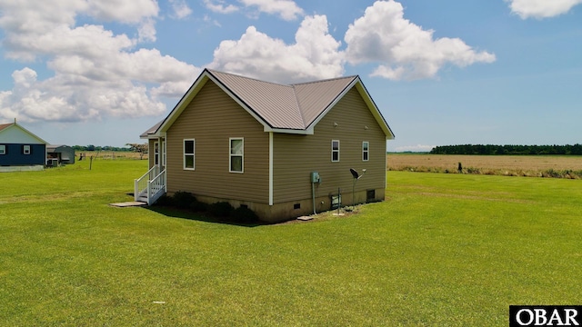 269 Lakeview Ct Lot 12, Engelhard, NC 27824 - view of side of home with a yard and a metal roof