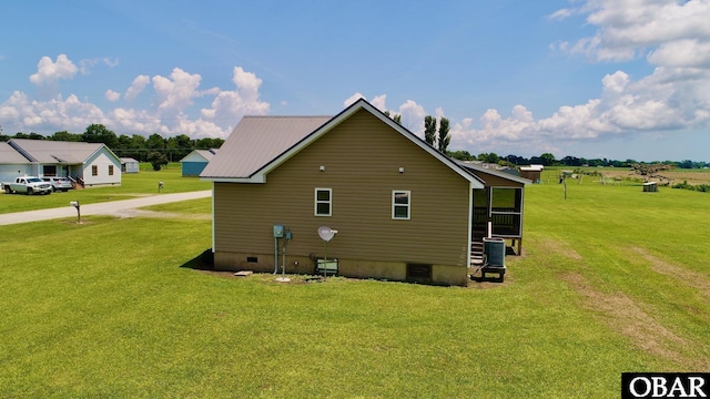 269 Lakeview Ct Lot 12, Engelhard, NC 27824 - view of home's exterior featuring crawl space, a lawn, and a metal roof