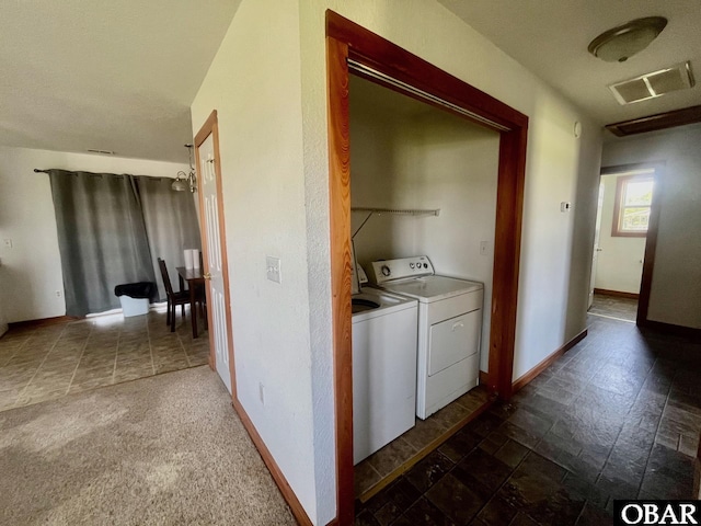269 Lakeview Ct Lot 12, Engelhard, NC 27824 - laundry room with washer and clothes dryer and dark stone finish floors
