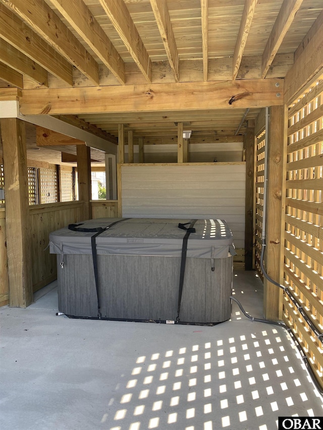 view of patio / terrace with a hot tub