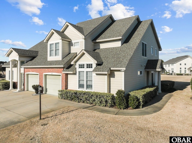 view of front of house featuring a garage, brick siding, concrete driveway, and roof with shingles