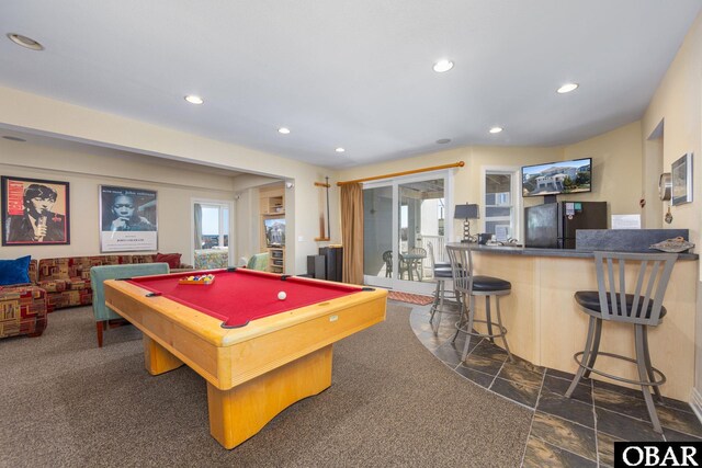 recreation room featuring pool table, stone finish flooring, a wealth of natural light, and recessed lighting