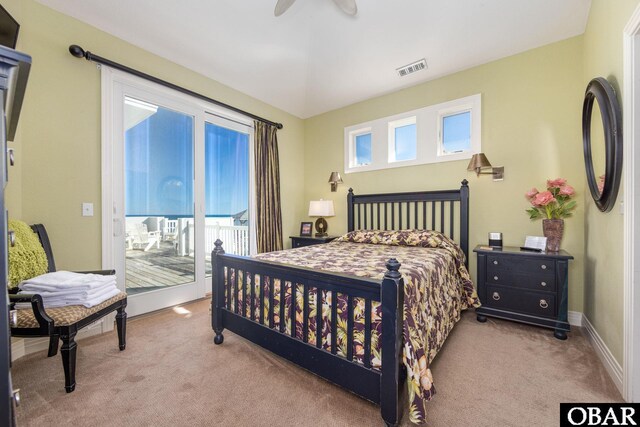 bedroom featuring ceiling fan, carpet flooring, visible vents, baseboards, and access to exterior