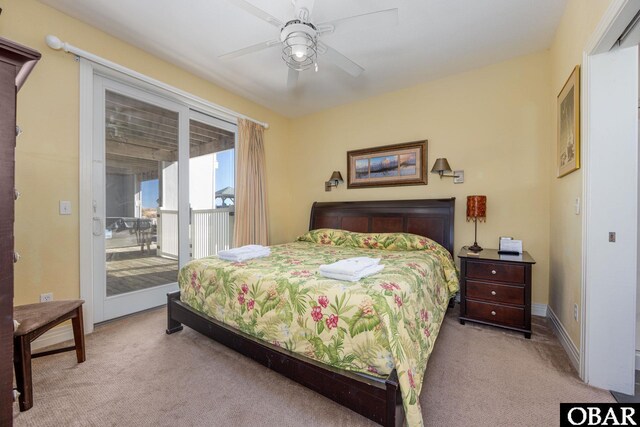 bedroom featuring ceiling fan, baseboards, light colored carpet, and access to exterior